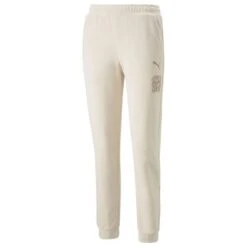 PUMA Sweatpants SHE MOVES THE GAME - Pristine Woman